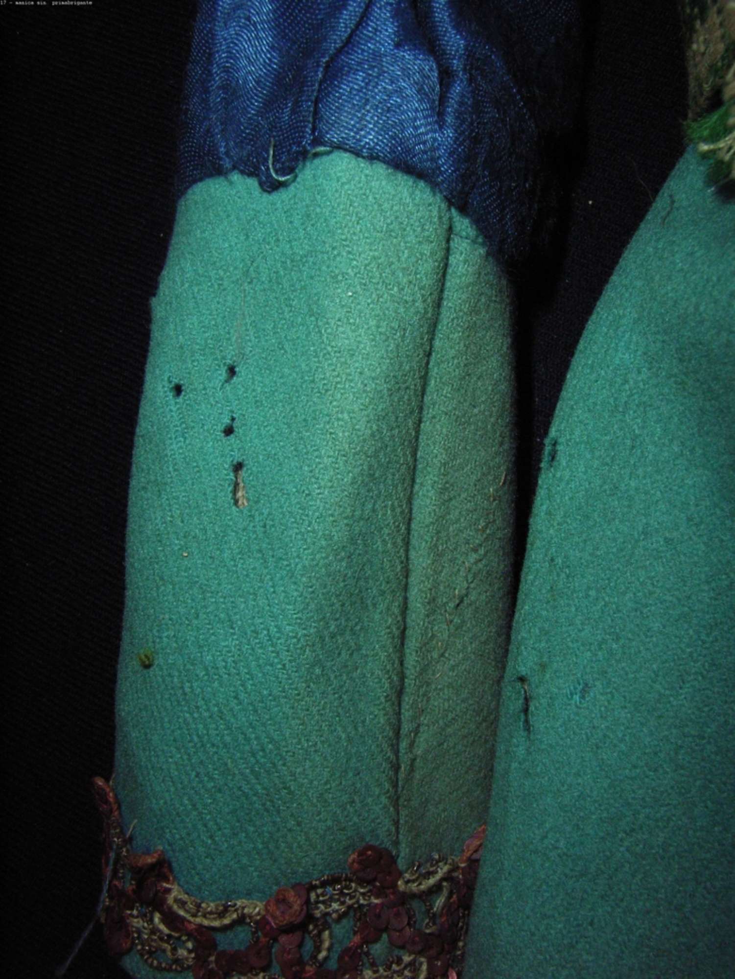 Manica sinistra prima del restauro